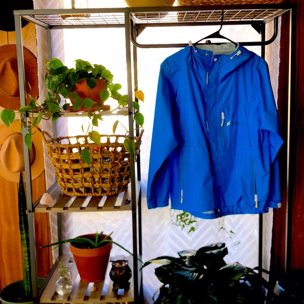 Size Medium Frogg Toggs rain jacket